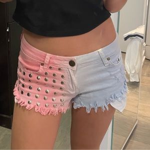 low rise pink and blue studded denim shorts